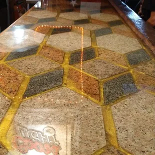 a bar top with a logo on it