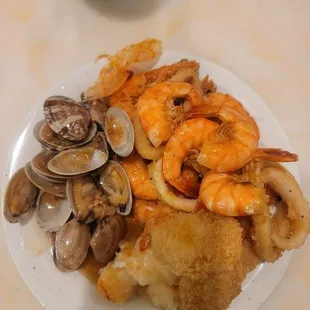 Fried shrimp with shell, coconut fried shrimp, fried shrimp, calamari, clams