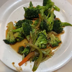 broccoli and carrots on a white plate