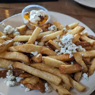 a plate of french fries