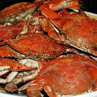 a bowl of steamed crabs