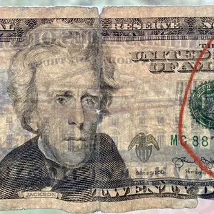 As you can see it clearly has the strip on left and the watermark on the right.