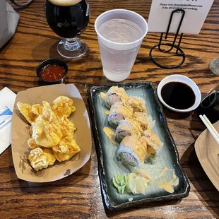 Pictured is the spicy California roll, crab Rangoon and Kentucky Maple Barrel Stout.