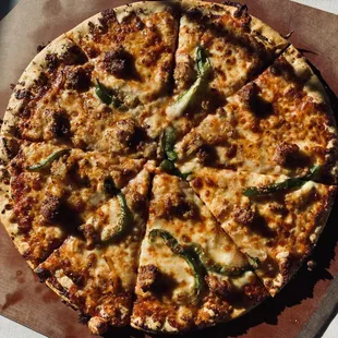 a pizza on a cutting board