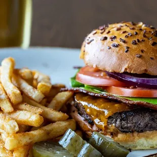 a burger and fries on a plate