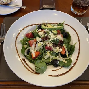 a plate of salad on a table