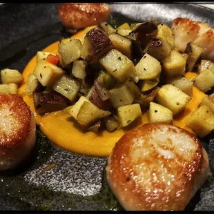 Seasonal scallops with green apple hash.