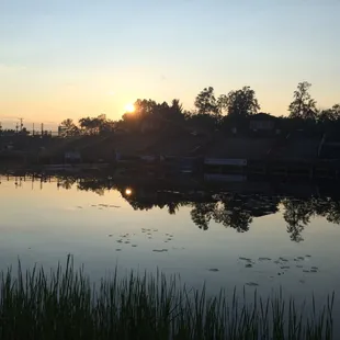 View from our table at sunset.  Notice the stands for the Lumberjack World Championship Games across the &quot;river.&quot;