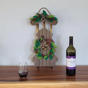 a bottle of wine and a wine glass