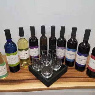 a selection of wine bottles and glasses