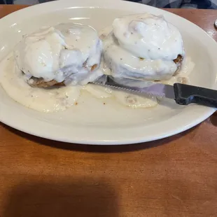 Biscuits and gravy with poached eggs