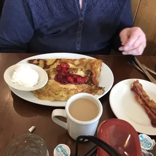 Cherry crepes / blintzes- with side of whipped cream and bacon. Coffee is decent too!