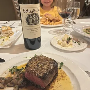 Fillet with sautéed mushrooms and a wonderful bottle of wine!