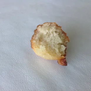 Doughy and bland hushpuppies only one tiny piece of onion in the whole puppy.