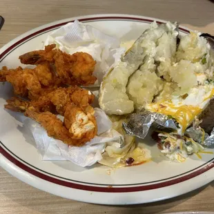 Greasy Fried Shrimp with rancid sour cream baked potato.