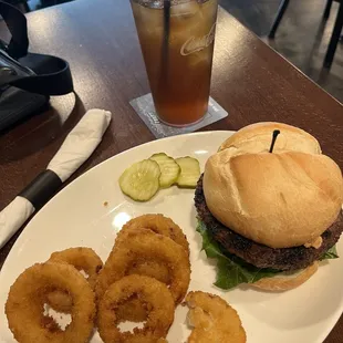 Burger and onion rings. Onion rings substitution $2