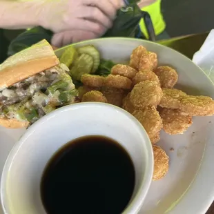 a plate of food and a cup of coffee