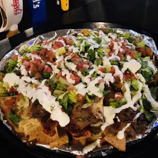 Spicy pork nachos