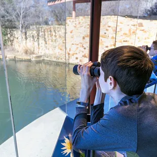 Exploring the pond in the Discovery Room