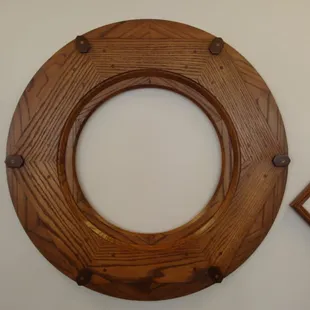 This custom frame was inspired by a piece of equipment found in a grist mill.  This frame is made of red oak with walnut acce...