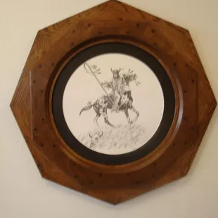 This frame is made of solid white oak and is comprised of 2 octagonal frames attached to each other...