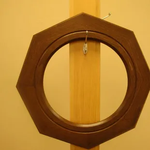 This frame is out of solid walnut and will accommodate a 14" diameter image or mirror.