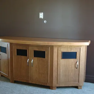 This project is made of cherry and was custom designed and built for a  client featuring their component needs and dimensions...