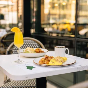 a breakfast on a table outside