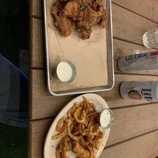 Chicken strips, curly fries.
