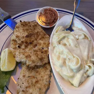 Pork Siciliano, breaded pork tenderloin is seasoned perfectly! Definitely recommend