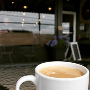 Dark roast with River Roasters Coffee Co. outside seating.