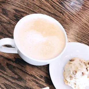 a cup of coffee and a biscuit