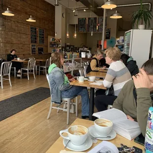 Enjoying coffee at the corner window(: