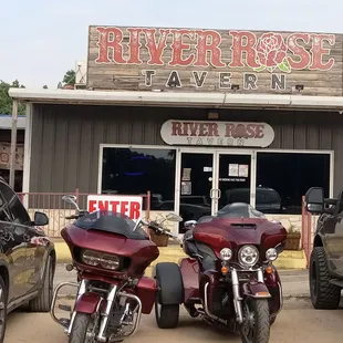 motorcycles parked in front of the restaurant