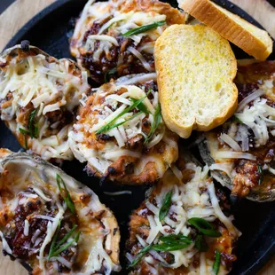 a plate of baked oysters