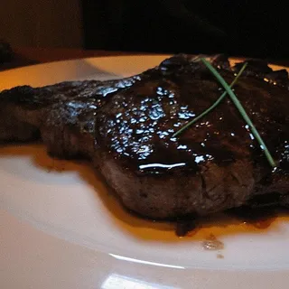 Bone-in Dry Aged Ribeye*
