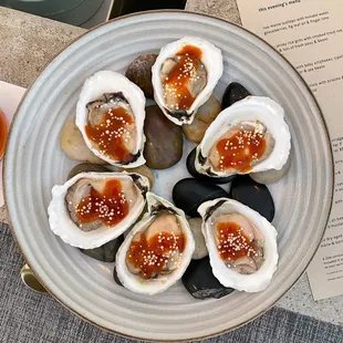 Oysters with strawberry gochujang, blood orange &amp; masago