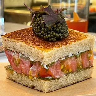 Heirloom tomato sandwich with smoked mayo, gamtae &amp; golden Ossetra caviar