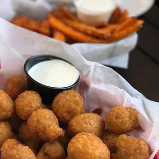 Fried mushrooms and sweet potatoe fries appetizer
