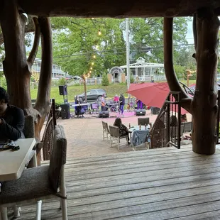 Outdoor music and seating under covered deck