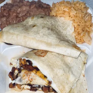 Al pastor quesadilla- It was like a lot of burnt crispy/chewy pieces. I went about 30 minutes before closing. Rice and beans were bomb!
