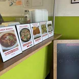 Menu items posted at the counter