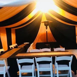 Tables chairs heaters &amp; draping