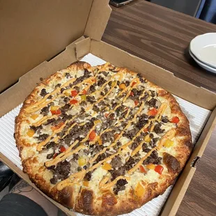 Cheesesteak pizza