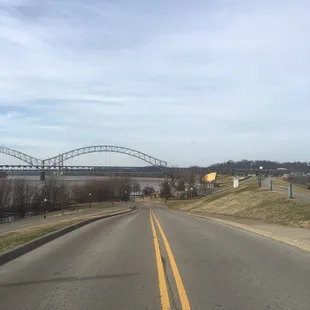 The road heading down to the park and riverfront amphitheater. (Sherman Minton Bridge in the background.)