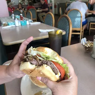 One of the few places that will let you have this for breakfast. Real meat, sautéed onions (opt), let,tom, and choice of cheese.       .