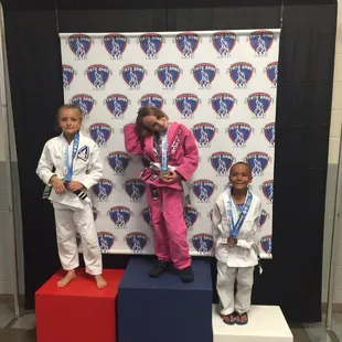 Cait competing at Sunflower Games underneath Rivers BJJ school