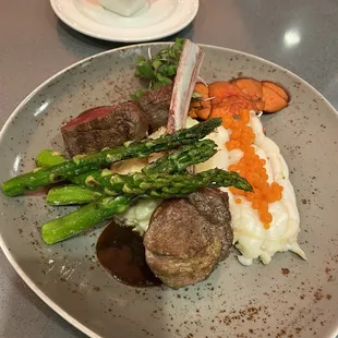 Friday 412 special -- Lamb chop, lobster tail and filet mignon for $41. Very good.