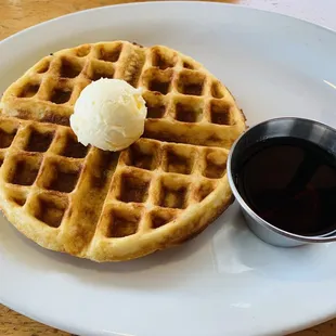 Waffle was delicious.  Crispy on the outside and fluffy a little on the inside.  Syrup wasn&apos;t super sweet which is perfect