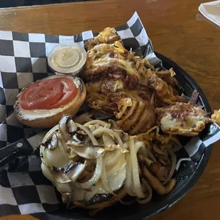 8oz burger with swiss cheese, onion, tomatoes, mayo served with loaded waffle fry's